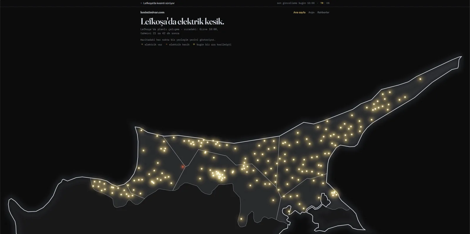 Live outage map: every settlement a glowing dot, the one without power marked red.